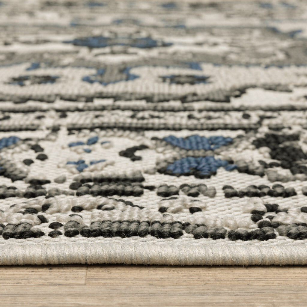 7' x 9' Blue and Beige Oriental Stain Resistant Indoor Outdoor Area Rug