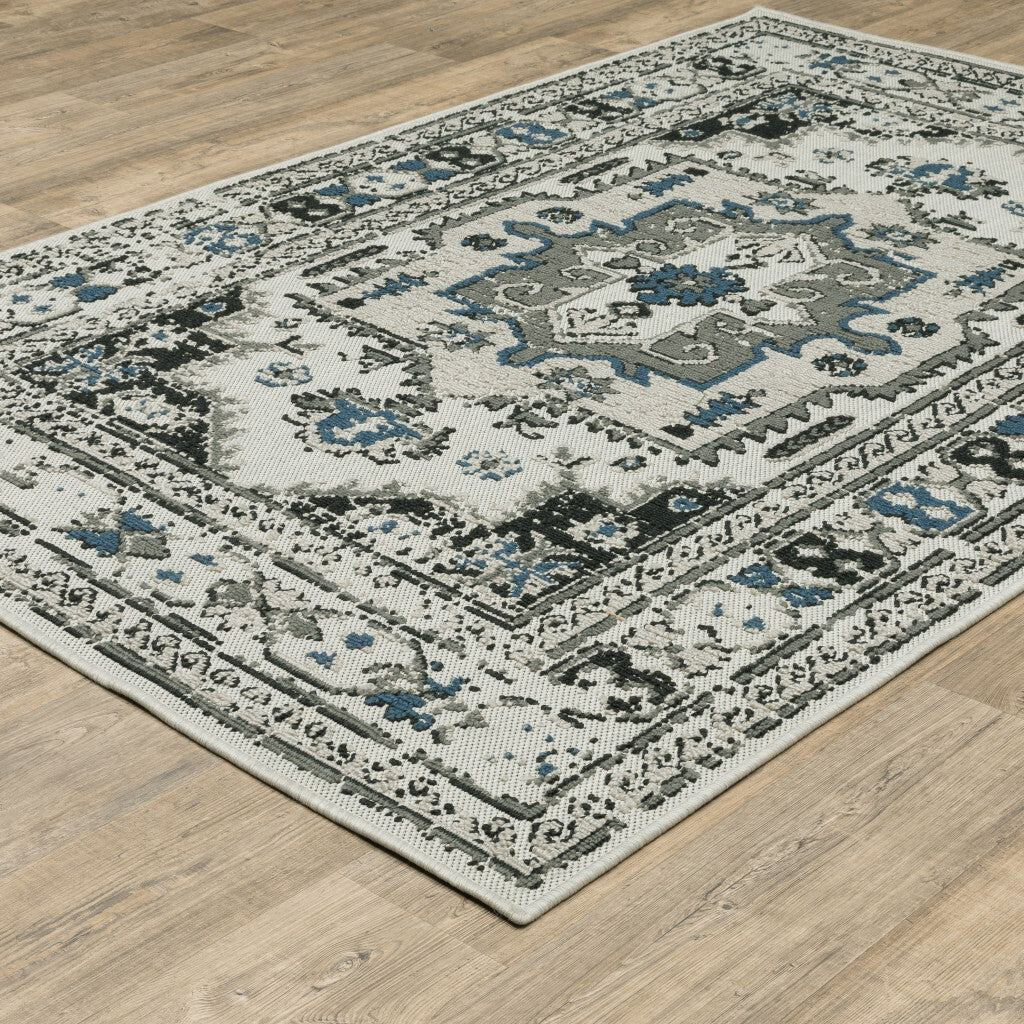 7' x 9' Blue and Beige Oriental Stain Resistant Indoor Outdoor Area Rug