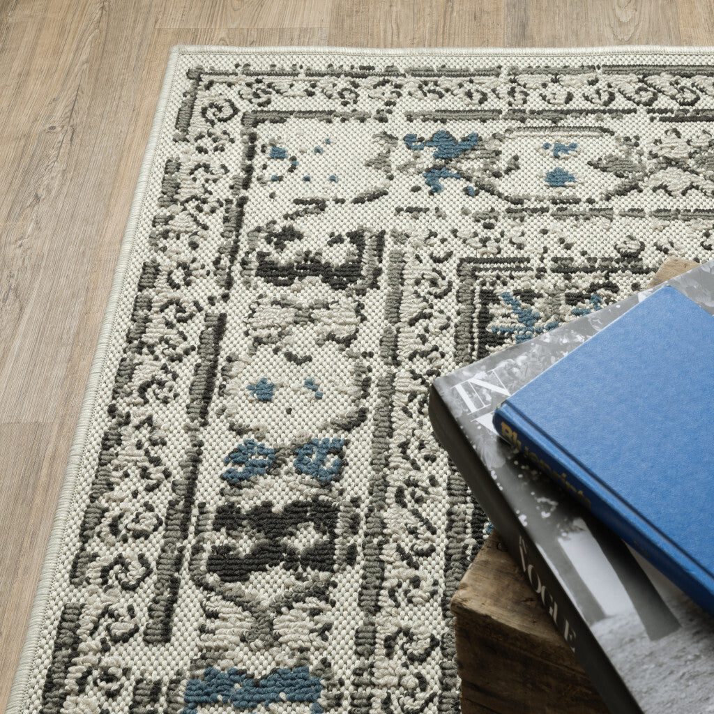 7' x 9' Blue and Beige Oriental Stain Resistant Indoor Outdoor Area Rug