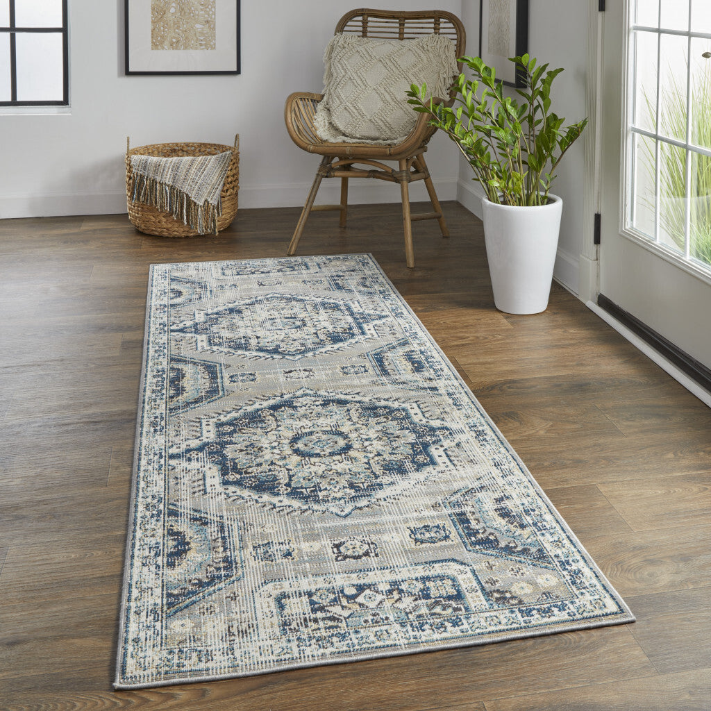 8' Blue And Ivory Abstract Power Loom Distressed Stain Resistant Runner Rug