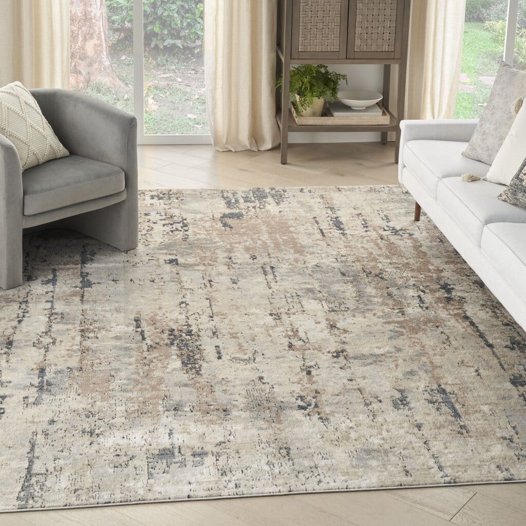 7' x 10' Beige Abstract Power Loom Area Rug